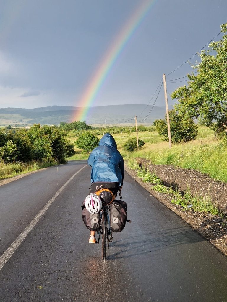 Anca cycling with rainbow